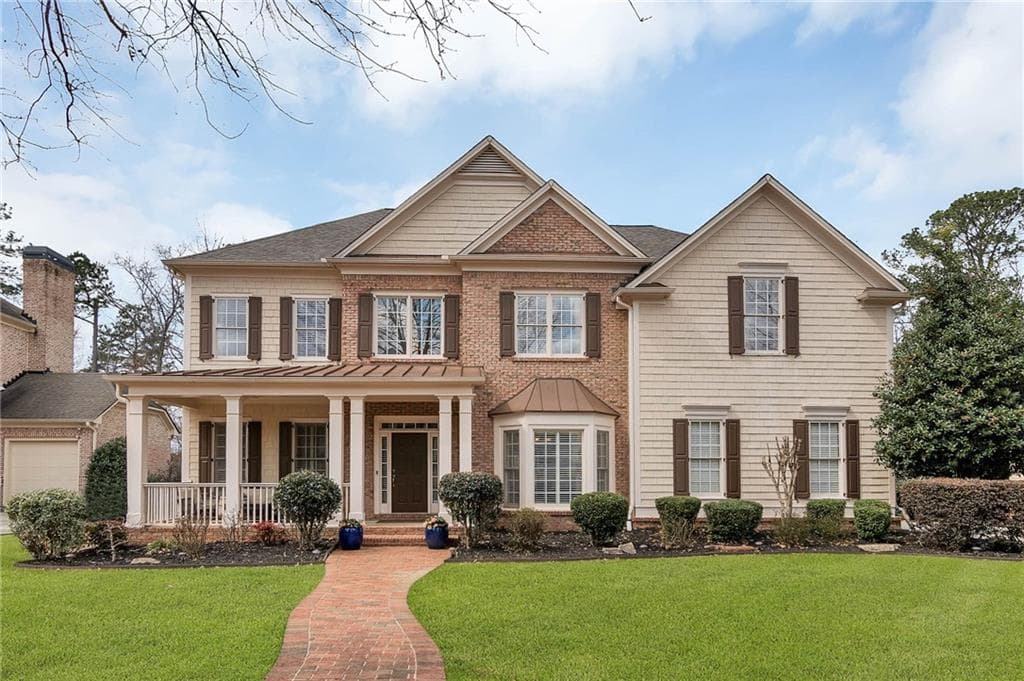 7 bedroom, 5 bathroom, 6,188 sq ft single family residence sold at 5038 Tarry Glen Drive, Suwanee, GA 30024