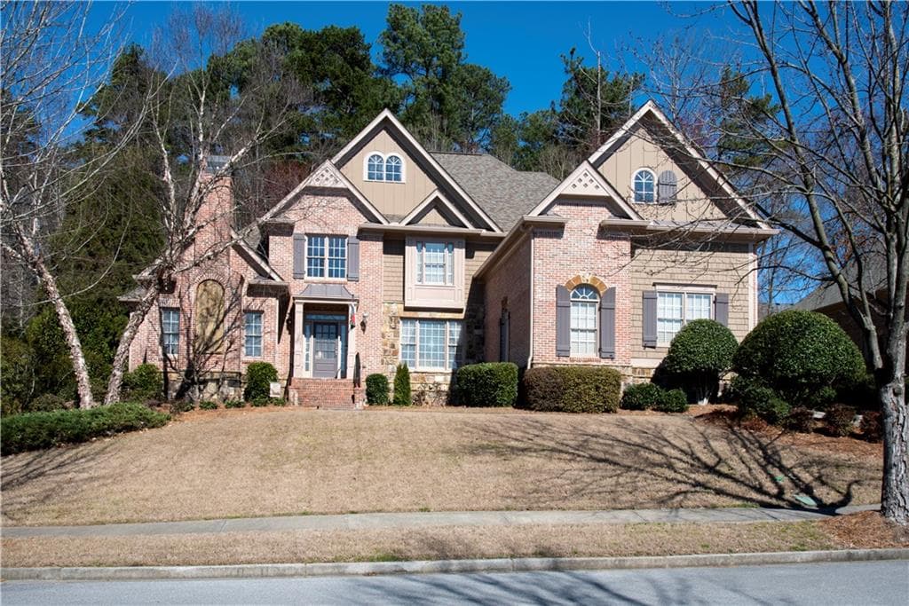 4 bedroom, 5 bathroom, 6,135 sq ft single family residence sold at 2608 Hidden Falls Drive, Buford, GA 30519