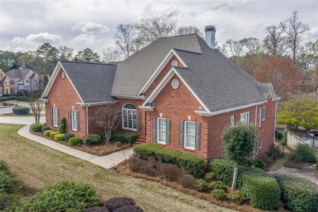5 bedroom, 5 bathroom, 4,100 sq ft single family residence sold at 1410 Woodland Lake Drive, Snellville, GA 30078
