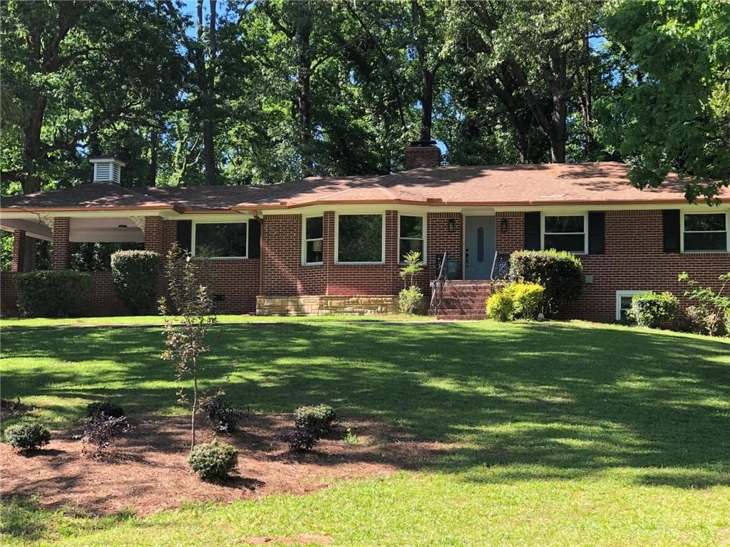 4 bedroom, 3 bathroom, 1,930 sq ft single family residence sold at 2059 W Cedar Lane, Atlanta, GA 30311