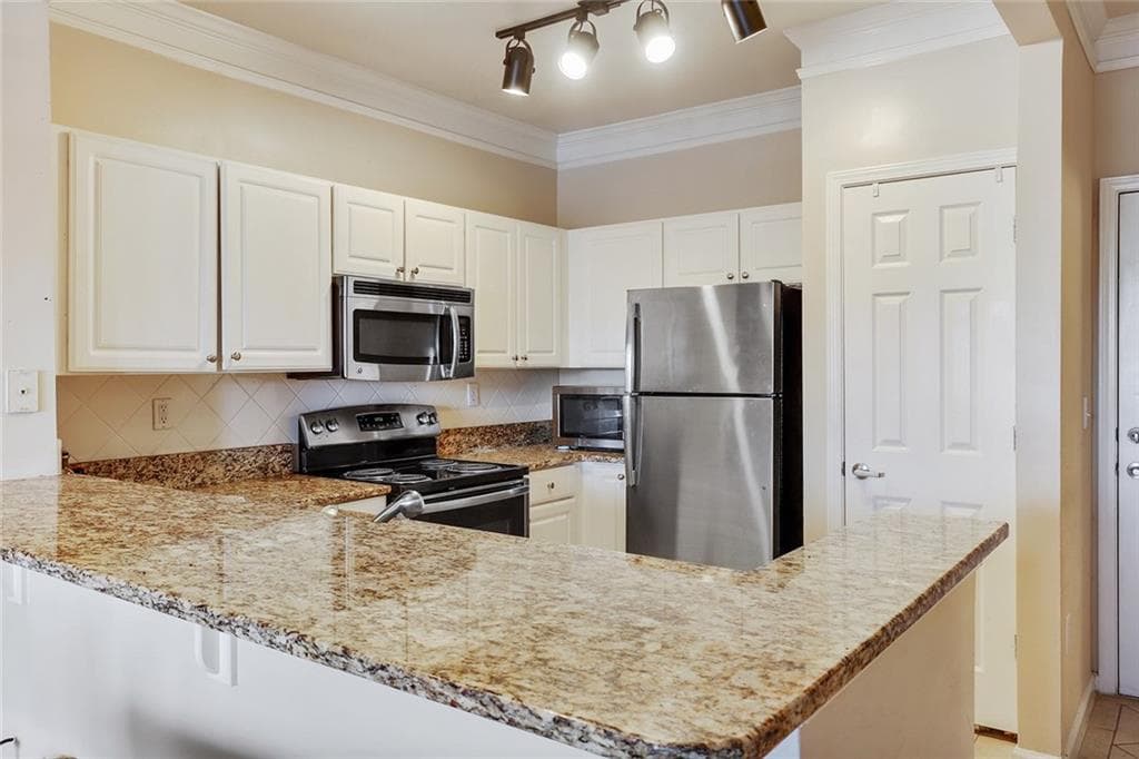 1 bedroom, 1 bathroom, 752 sq ft condominium sold at 1850 Cotillion Drive 2218, Atlanta, GA 30338