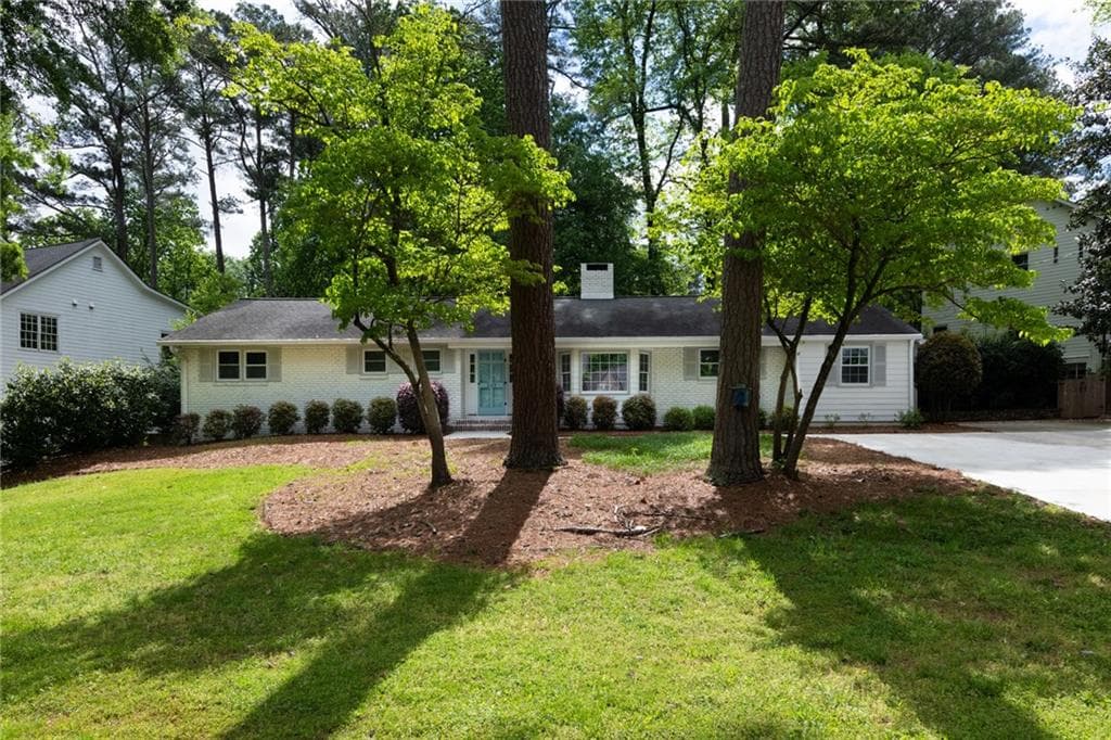 4 bedroom, 2 bathroom, 2,075 sq ft single family residence sold at 3129 E Wood Valley Road, Atlanta, GA 30327