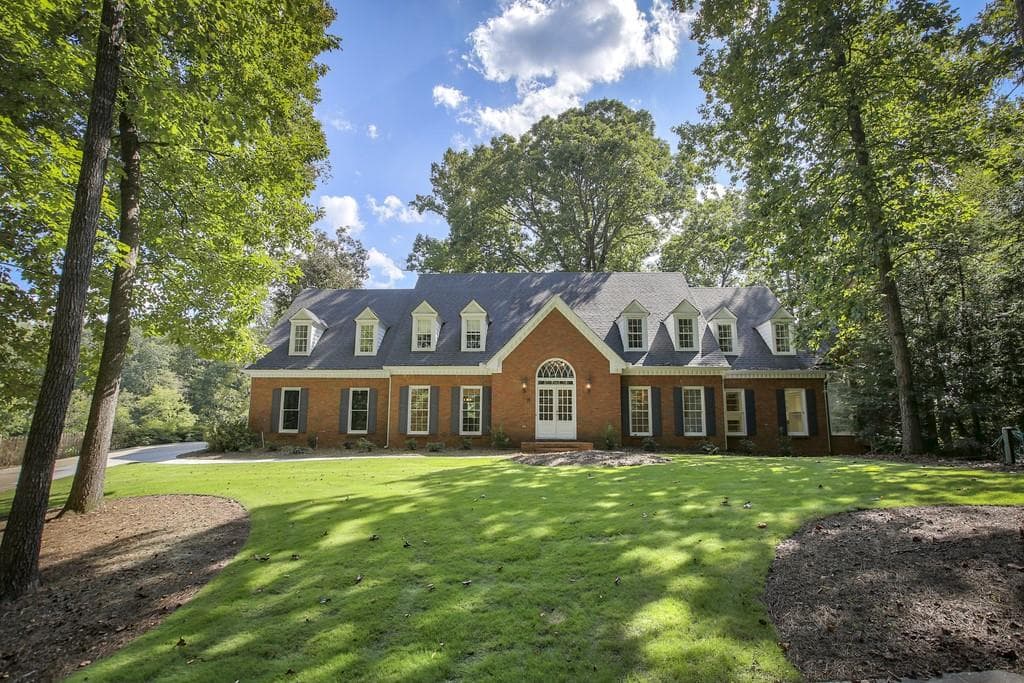 6 bedroom, 5 bathroom, 8,967 sq ft single family residence sold at 1206 N Lake Drive, Canton, GA 30115
