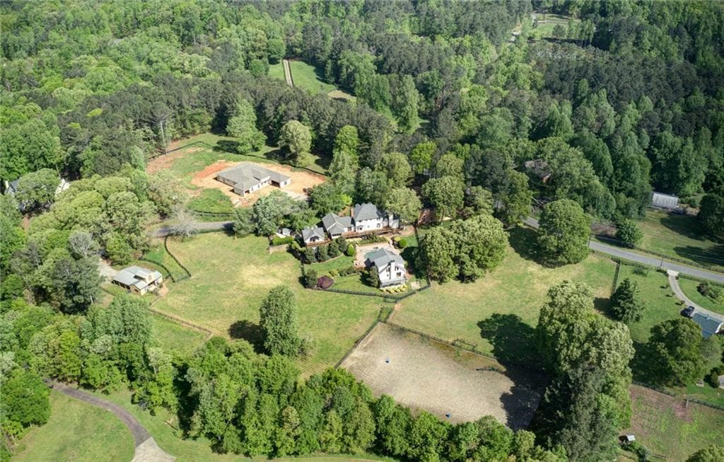 4 bedroom, 3 bathroom, 6,505 sq ft single family residence sold at 10 Stone Creek Trail, Alpharetta, GA 30004