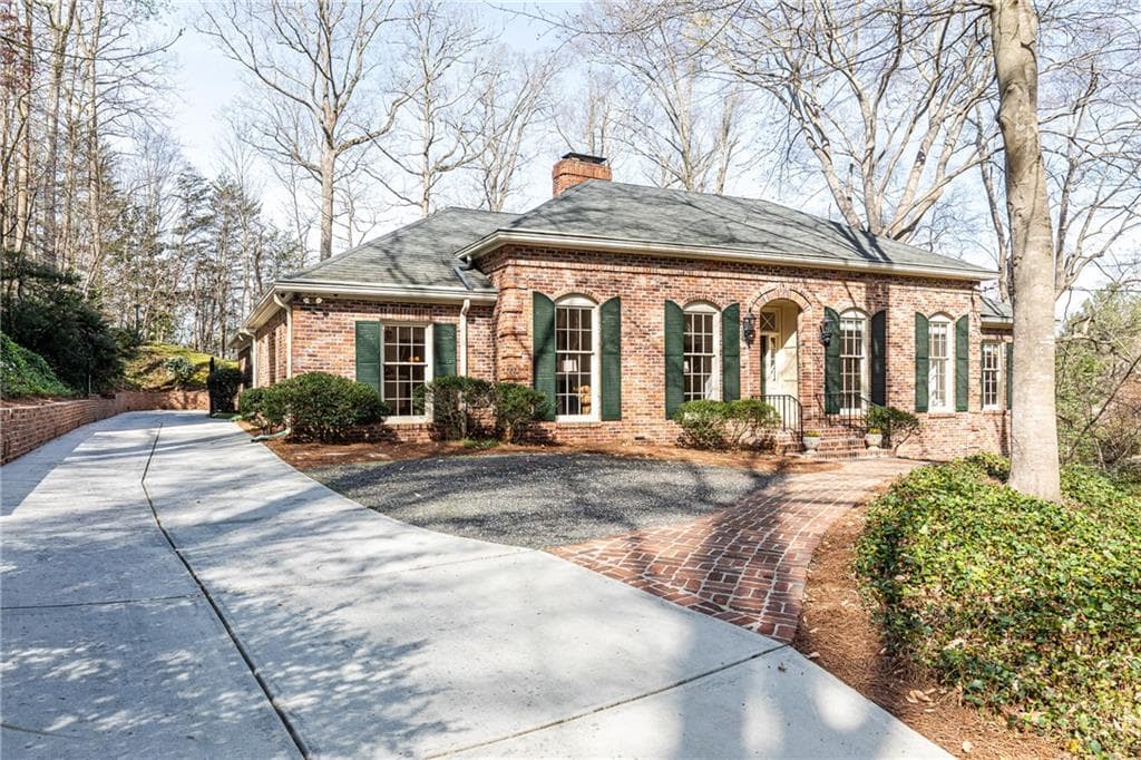 4 bedroom, 4 bathroom, 3,900 sq ft single family residence sold at 3388 Wood Valley Road, Atlanta, GA 30327