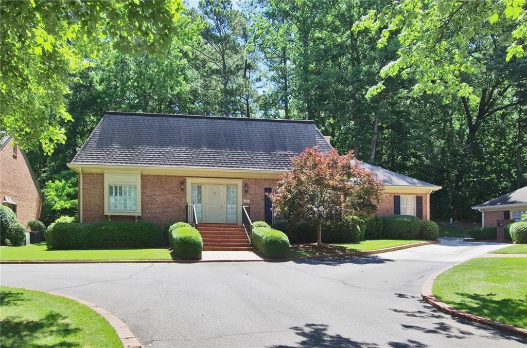 4 bedroom, 3 bathroom, 4,084 sq ft single family residence sold at 1845 Bedforshire Drive, Decatur, GA 30033