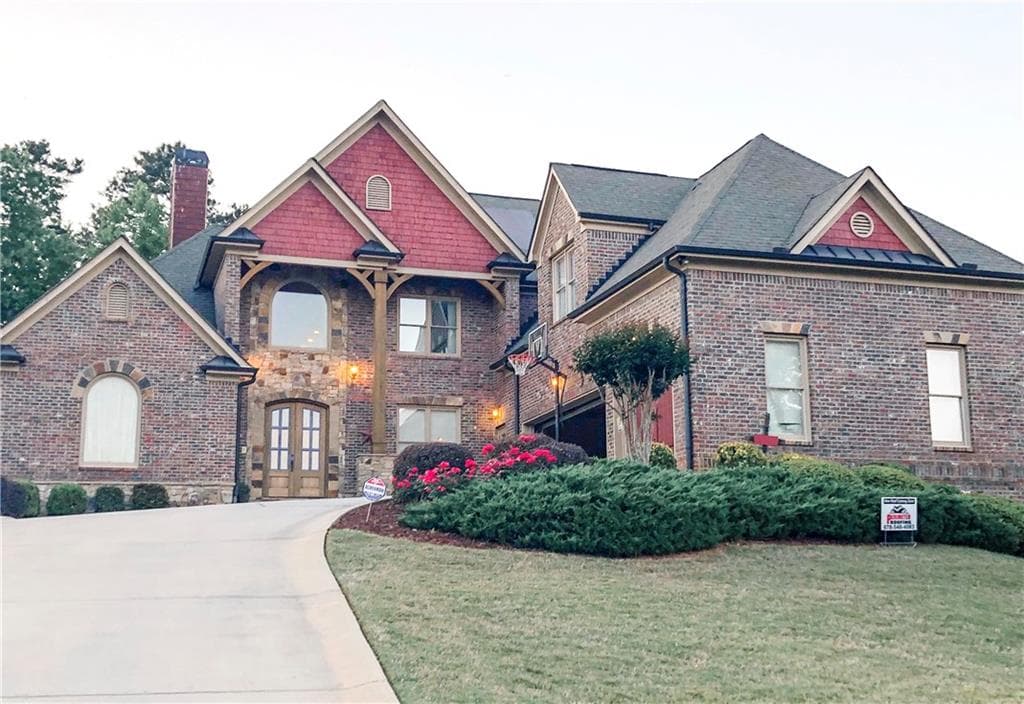 6 bedroom, 5 bathroom, 4,436 sq ft single family residence sold at 2711 Wildflower Way, Hoschton, GA 30548