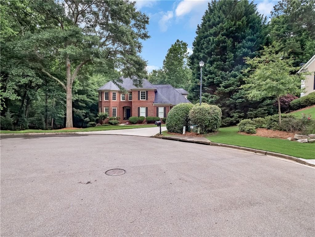 6 bedroom, 4 bathroom, 3,600 sq ft single family residence sold at 6935 Carmel Court, Suwanee, GA 30024