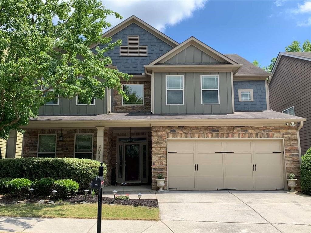 5 bedroom, 4 bathroom, 3,200 sq ft single family residence sold at 2053 Village Crest Drive, Atlanta, GA 30318