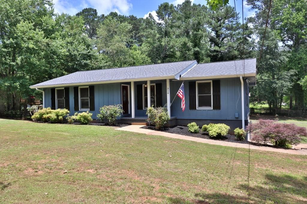 3 bedroom, 2 bathroom, 1,400 sq ft single family residence sold at 314 Stations Avenue, Woodstock, GA 30189