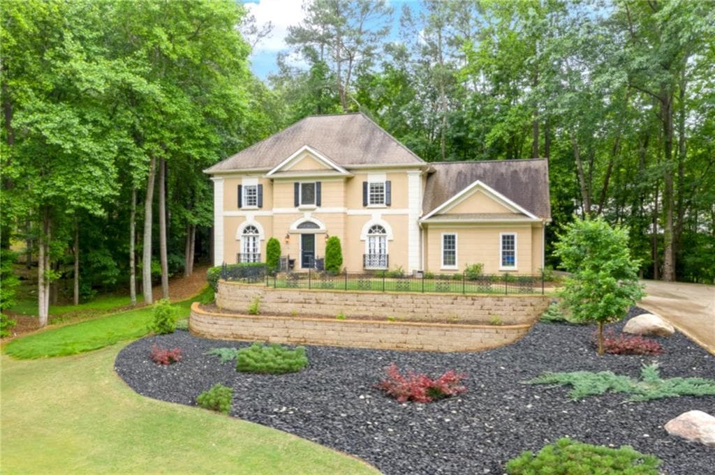 4 bedroom, 4 bathroom, 3,315 sq ft single family residence sold at 410 Fawn Glen Drive, Roswell, GA 30075