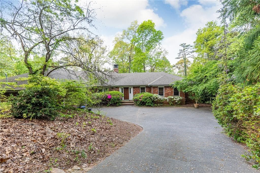 4 bedroom, 6 bathroom single family residence sold at 4950 Riverview Road, Sandy Springs, GA 30327