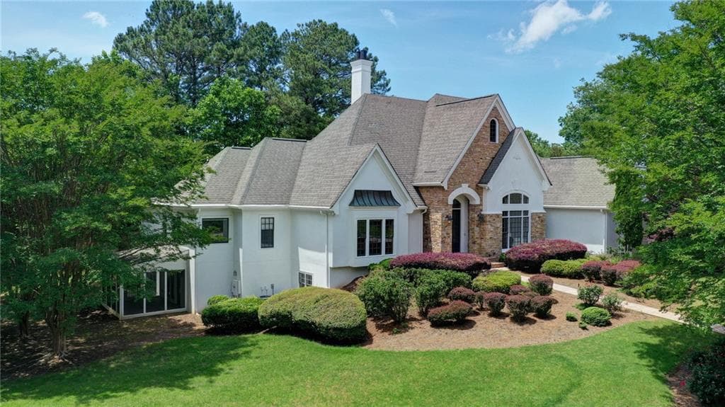5 bedroom, 6 bathroom, 7,900 sq ft single family residence sold at 125 N Devereux Court, Atlanta, GA 30327
