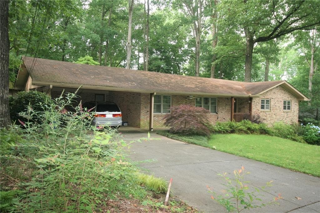 4 bedroom, 3 bathroom, 2,250 sq ft single family residence sold at 2423 Woodleaf Lane, Decatur, GA 30033