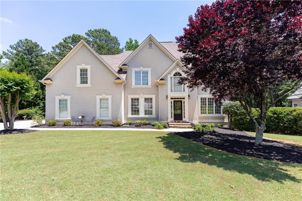 4 bedroom, 3 bathroom, 3,268 sq ft single family residence sold at 1245 Woodland Trace, Cumming, GA 30041