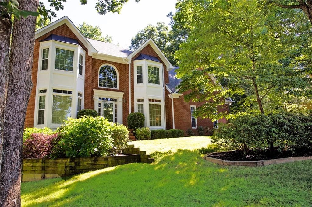 4 bedroom, 3 bathroom, 5,345 sq ft single family residence sold at 1870 Edgemont Court, Cumming, GA 30041