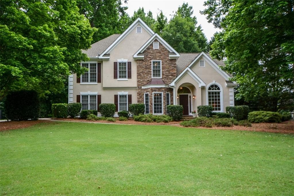 4 bedroom, 3 bathroom, 2,272 sq ft single family residence sold at 940 Taylor Parkway, Suwanee, GA 30024