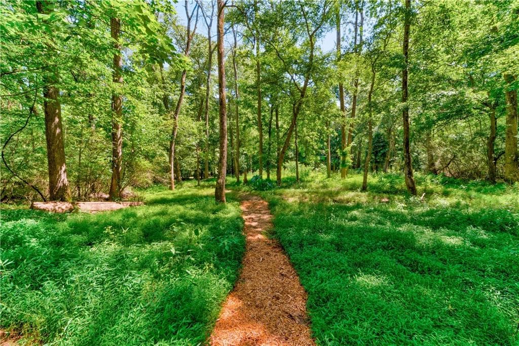 4 bedroom, 4 bathroom, 4,931 sq ft single family residence sold at 197 Timberlost Trail, Suwanee, GA 30024