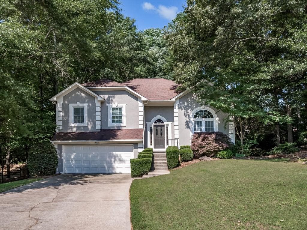 4 bedroom, 3 bathroom, 2,426 sq ft single family residence sold at 6150 Westminister Green, Suwanee, GA 30024
