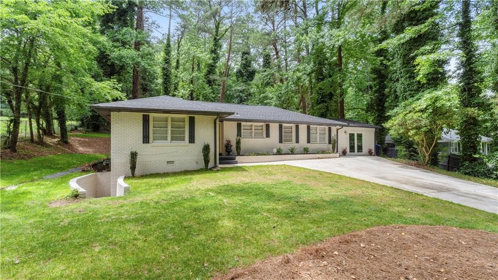 3 bedroom, 3 bathroom, 2,100 sq ft single family residence sold at 1955 Childress Drive, Atlanta, GA 30311