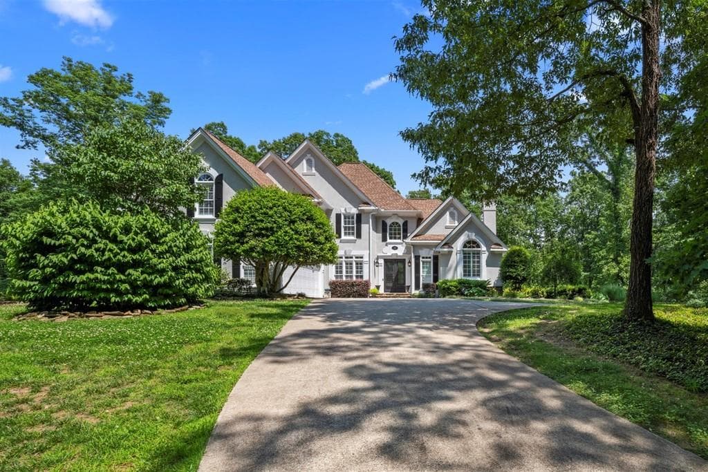 5 bedroom, 5 bathroom, 6,233 sq ft single family residence sold at 102 Coldstream Court, Canton, GA 30115
