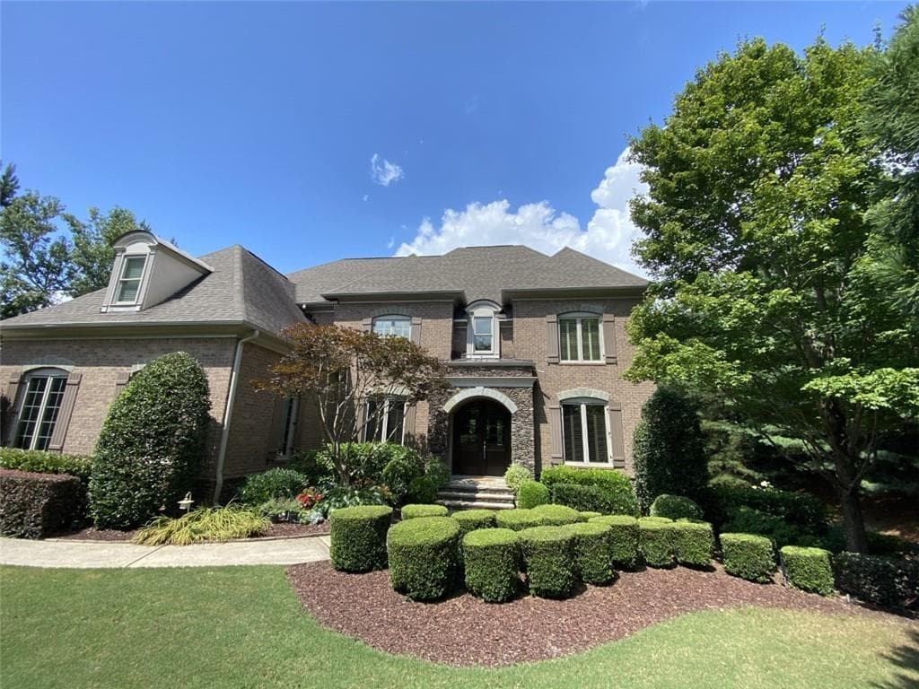 5 bedroom, 6 bathroom, 6,856 sq ft single family residence sold at 1000 Windsor Green Drive, Canton, GA 30115