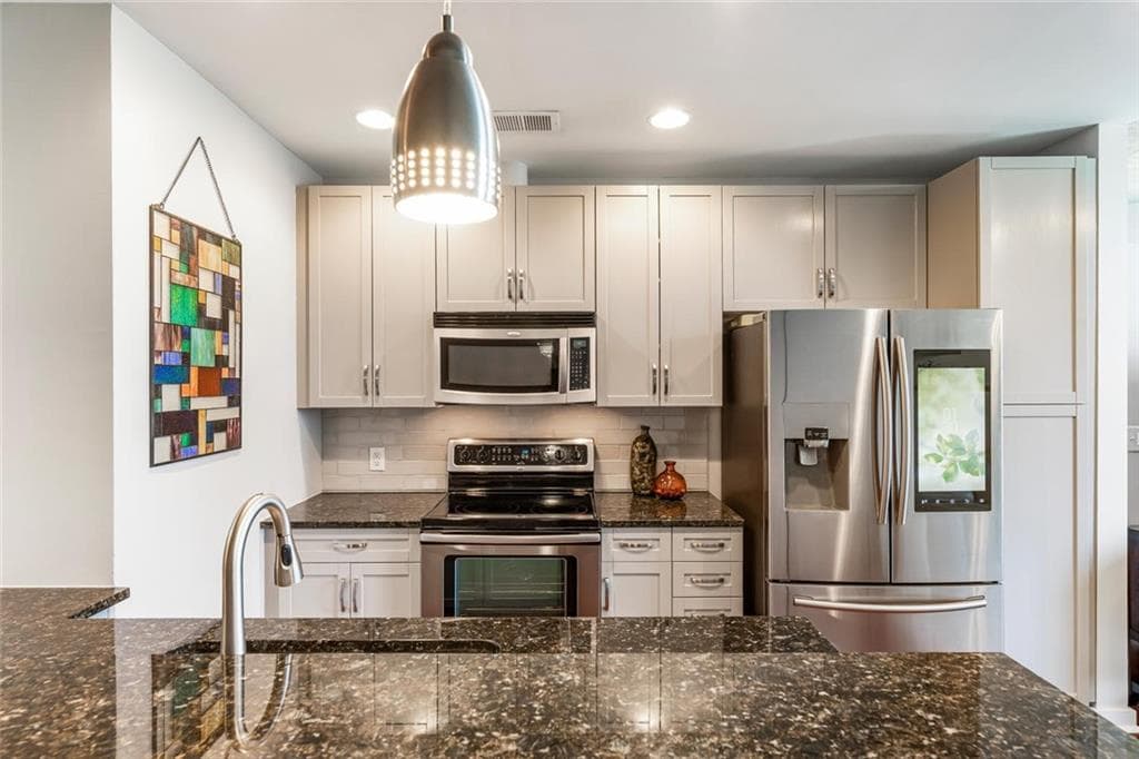 1 bedroom, 1 bathroom, 838 sq ft condominium sold at 855 Peachtree Street 1311, Atlanta, GA 30308