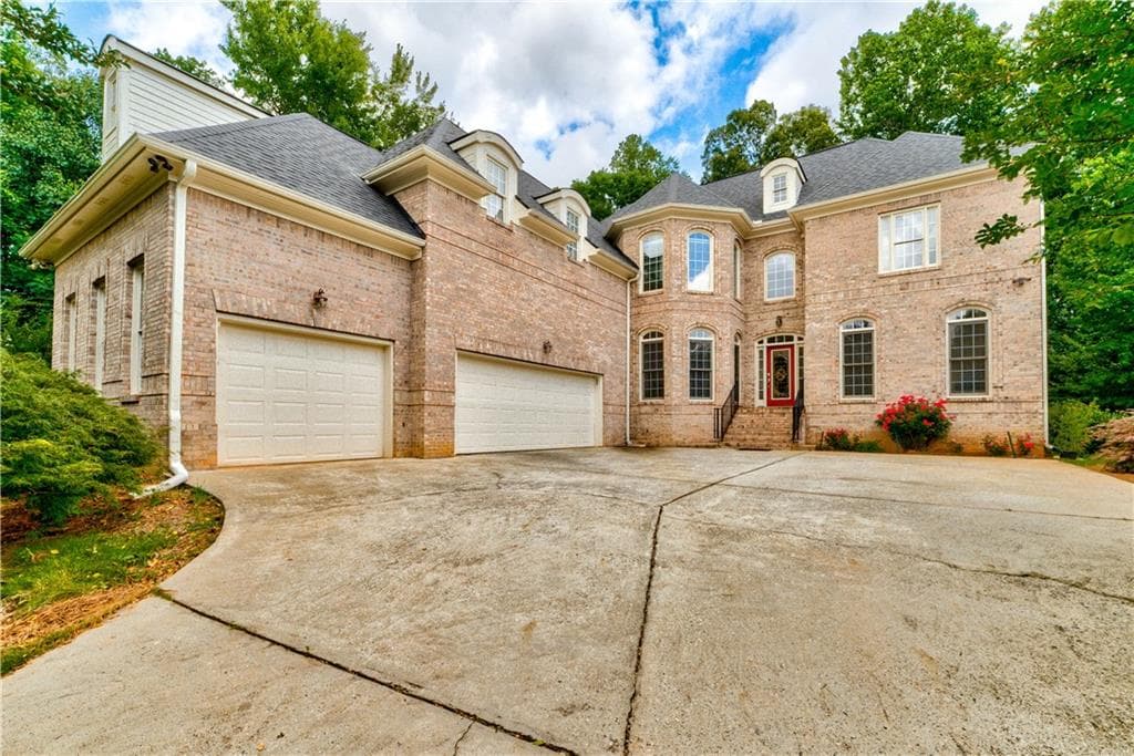 7 bedroom, 7 bathroom, 6,232 sq ft single family residence sold at 14025 Old Course Drive, Roswell, GA 30075