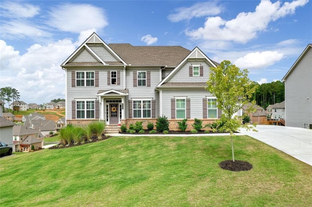5 bedroom, 4 bathroom, 4,105 sq ft single family residence sold at 212 Sundance Drive, Woodstock, GA 30188