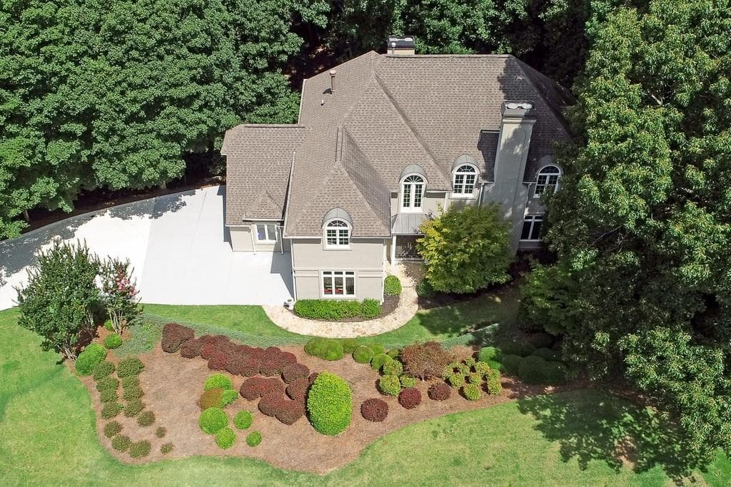 5 bedroom, 5 bathroom, 6,487 sq ft single family residence sold at 8680 River Trace, Roswell, GA 30076