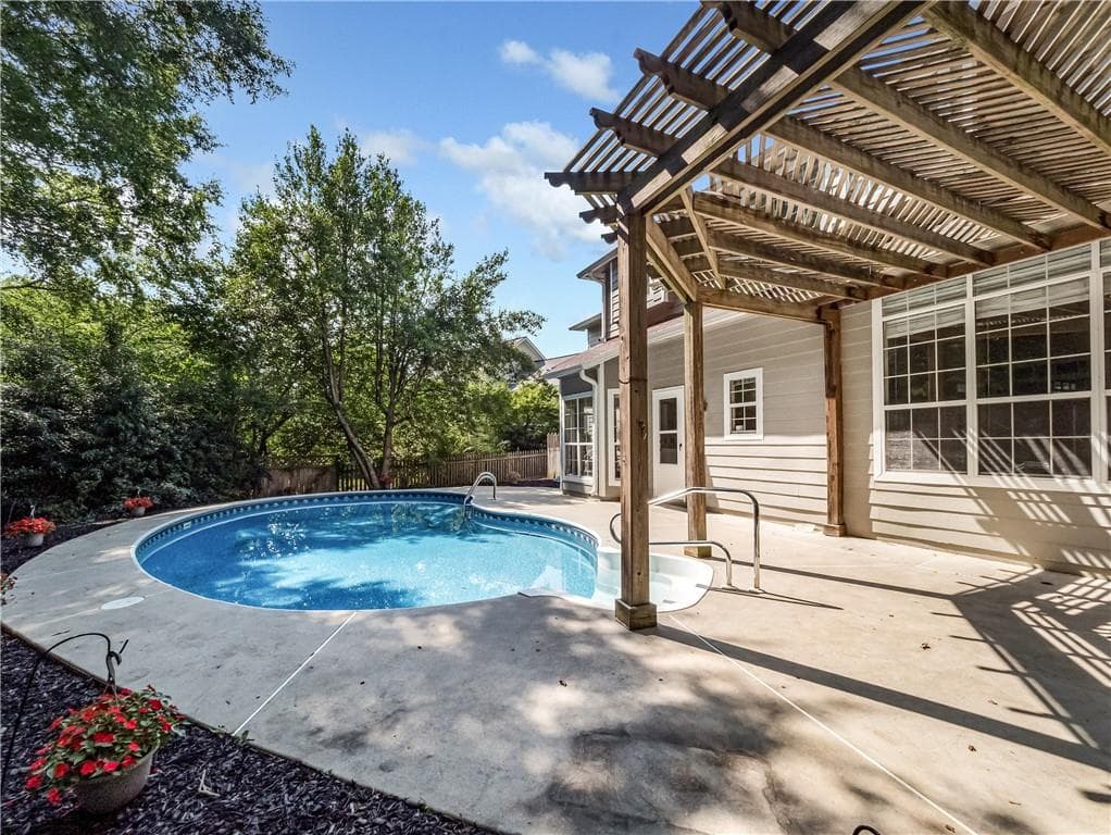 4 bedroom, 3 bathroom, 2,704 sq ft single family residence sold at 235 Greenmont Downs Lane, Alpharetta, GA 30009
