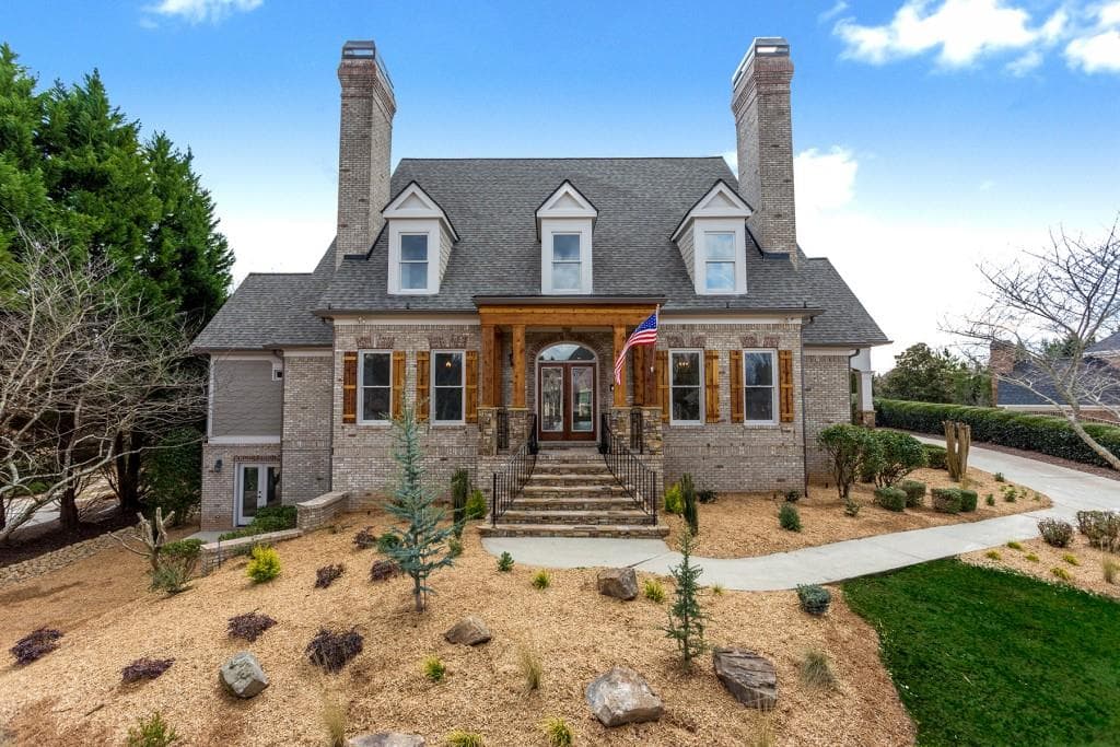 6 bedroom, 7 bathroom, 7,792 sq ft single family residence sold at 2450 Flat Stone Drive, Cumming, GA 30041