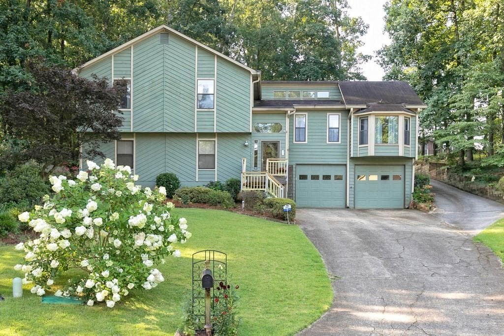 4 bedroom, 4 bathroom, 3,938 sq ft single family residence sold at 1110 Tom Lane, Marietta, GA 30066