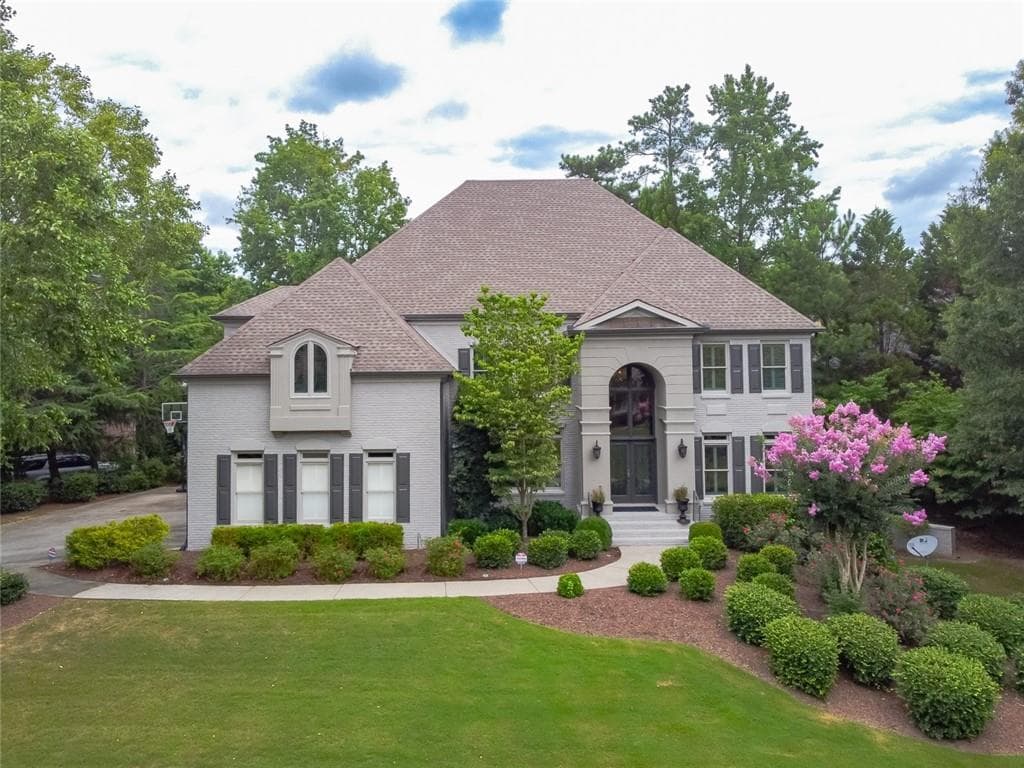 6 bedroom, 7 bathroom, 6,918 sq ft single family residence sold at 10160 High Falls Pointe, Johns Creek, GA 30022