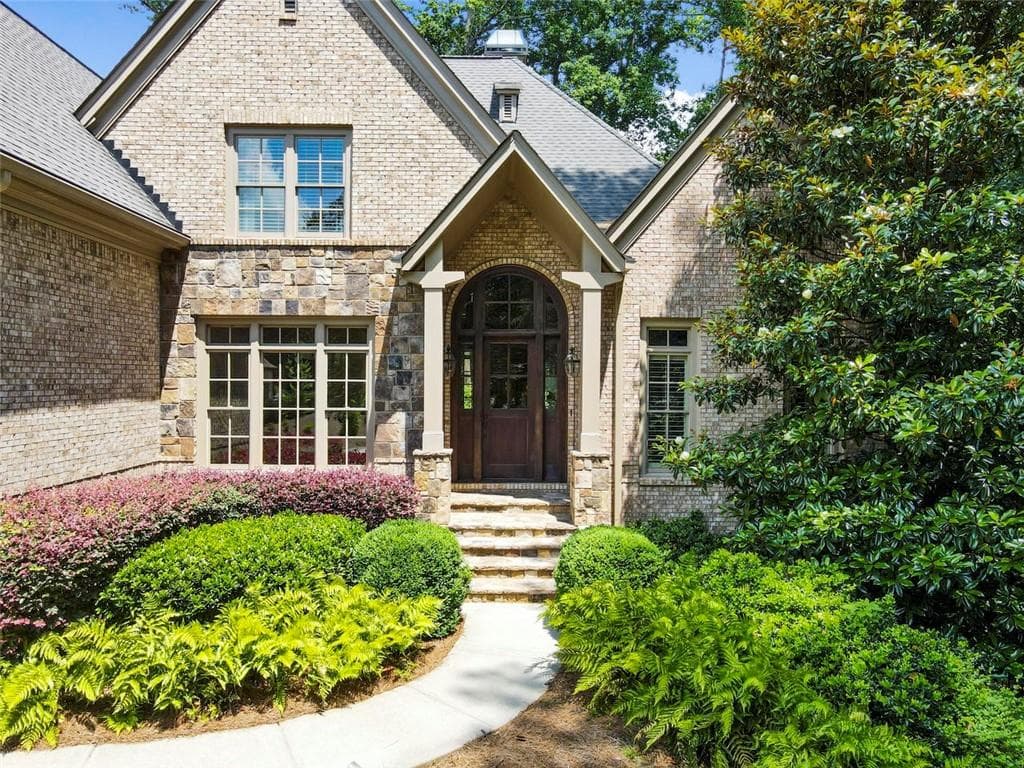 5 bedroom, 6 bathroom, 7,198 sq ft single family residence sold at 5207 Lake Forrest Drive, Atlanta, GA 30342