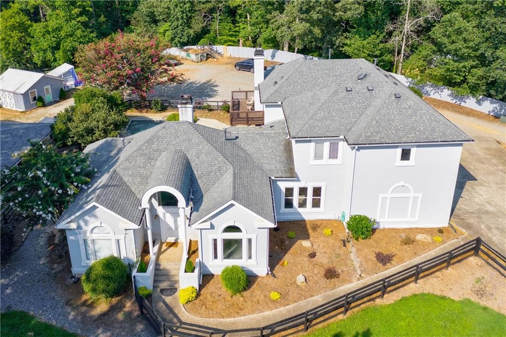 4 bedroom, 4 bathroom, 3,321 sq ft single family residence sold at 10785 Shallowford Road, Roswell, GA 30075