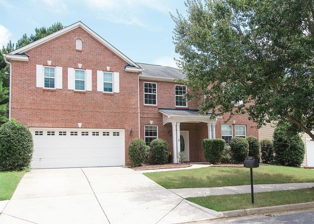 4 bedroom, 3 bathroom, 3,592 sq ft single family residence sold at 1148 Sparkling Cove Drive, Buford, GA 30518