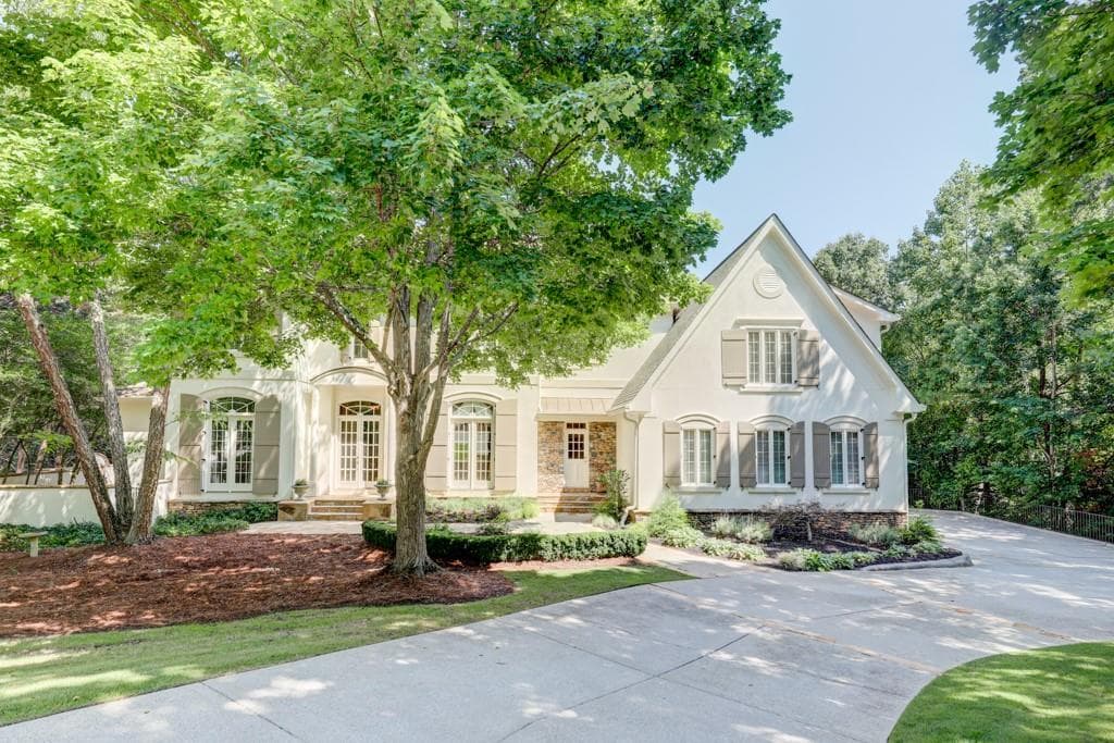 6 bedroom, 7 bathroom, 5,697 sq ft single family residence sold at 8425 Sentinae Chase Drive, Roswell, GA 30076