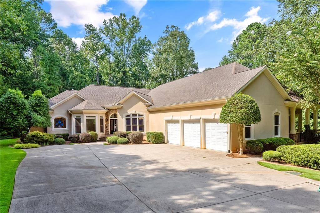 4 bedroom, 4 bathroom, 5,647 sq ft single family residence sold at 2406 Stoney Point Road, Cumming, GA 30041