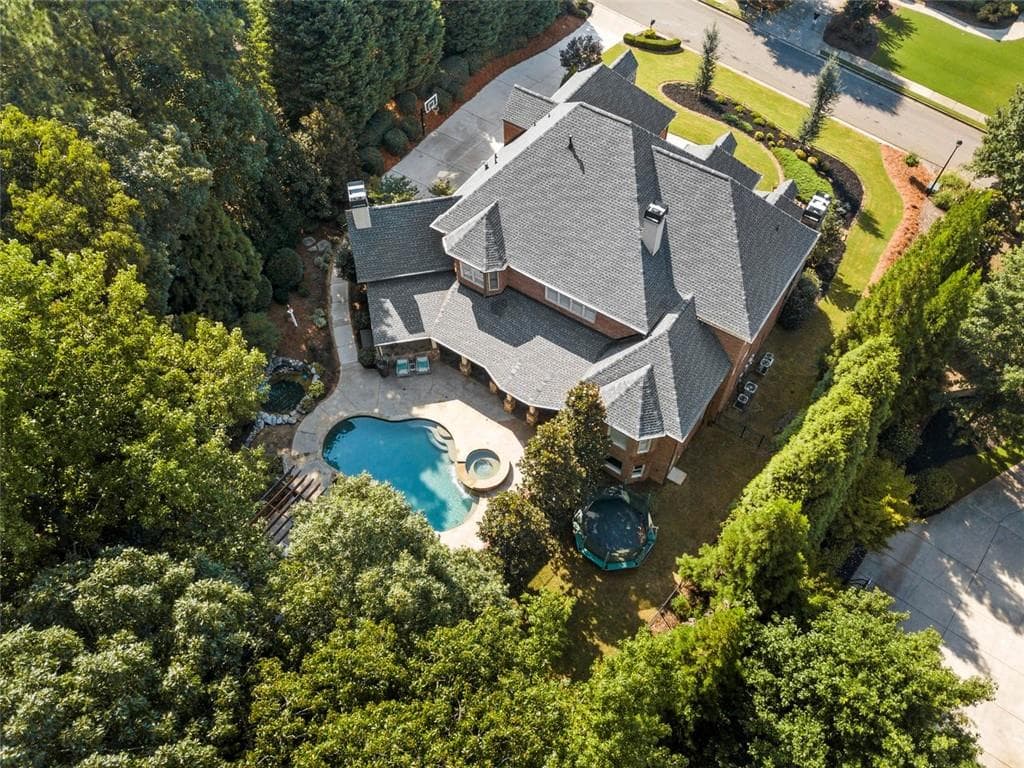 6 bedroom, 7 bathroom, 8,970 sq ft single family residence sold at 2970 Creek Tree Lane, Cumming, GA 30041