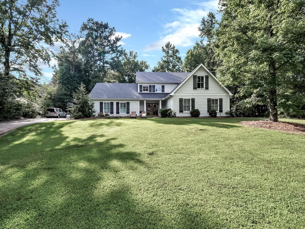 5 bedroom, 4 bathroom, 3,076 sq ft single family residence sold at 1068 Lake Charles Drive, Roswell, GA 30075