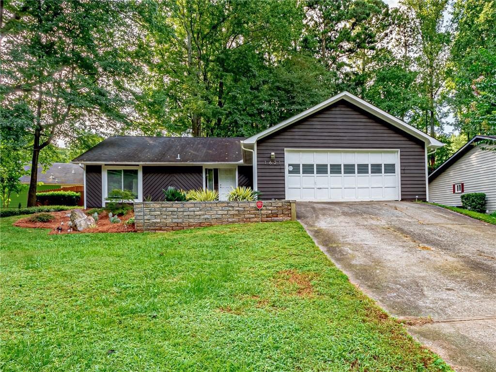 3 bedroom, 2 bathroom, 1,848 sq ft single family residence sold at 1621 Spender Drive, Norcross, GA 30093
