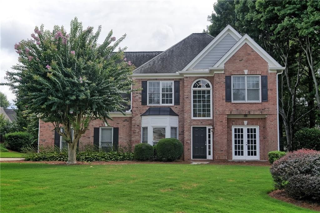 4 bedroom, 3 bathroom, 2,107 sq ft single family residence sold at 215 Greystone Court, Roswell, GA 30075