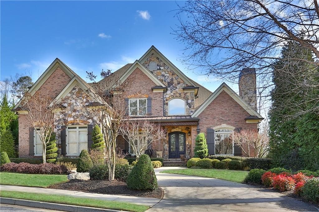 6 bedroom, 7 bathroom, 7,676 sq ft single family residence sold at 8760 Colonial Place, Duluth, GA 30097