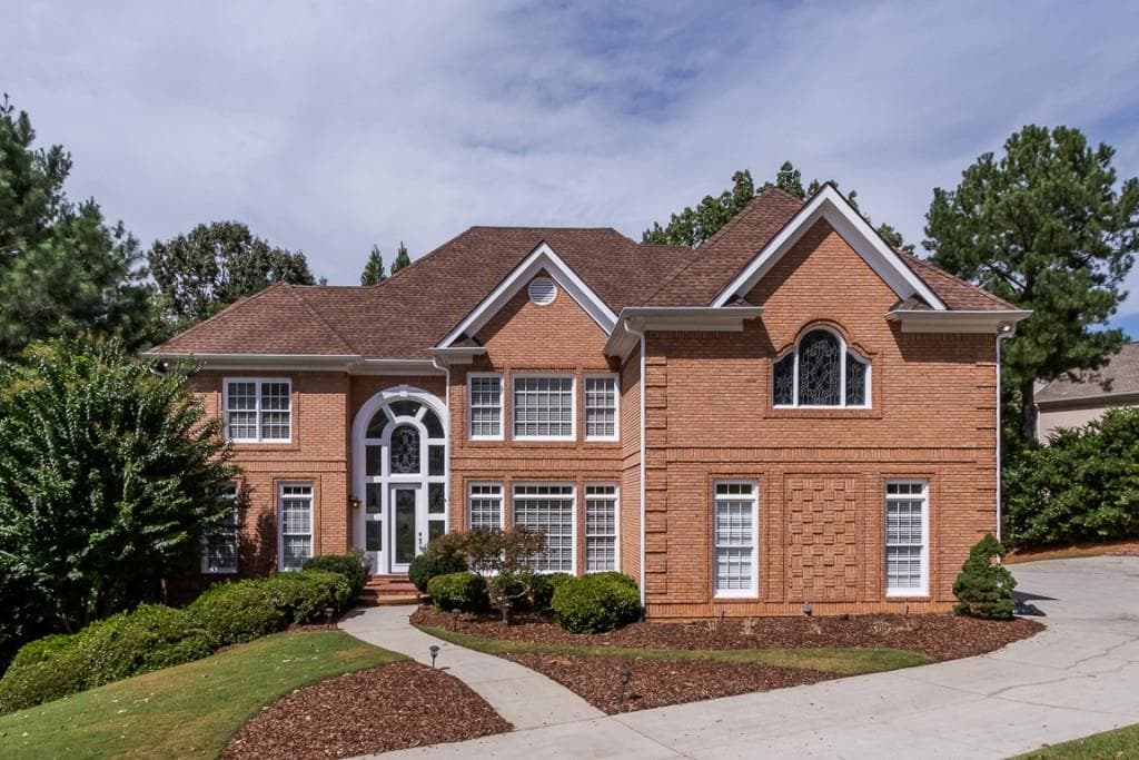 7 bedroom, 7 bathroom, 6,159 sq ft single family residence sold at 8405 Sentinae Chase Drive, Roswell, GA 30076