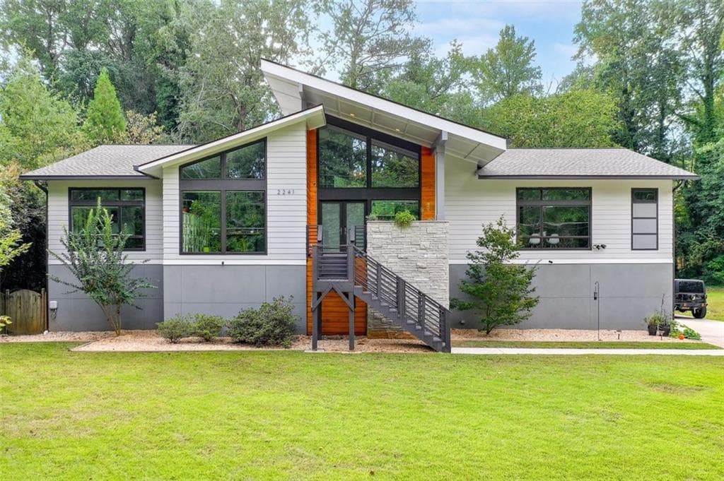 6 bedroom, 5 bathroom, 6,100 sq ft single family residence sold at 2241 Fisher Trail, Atlanta, GA 30345