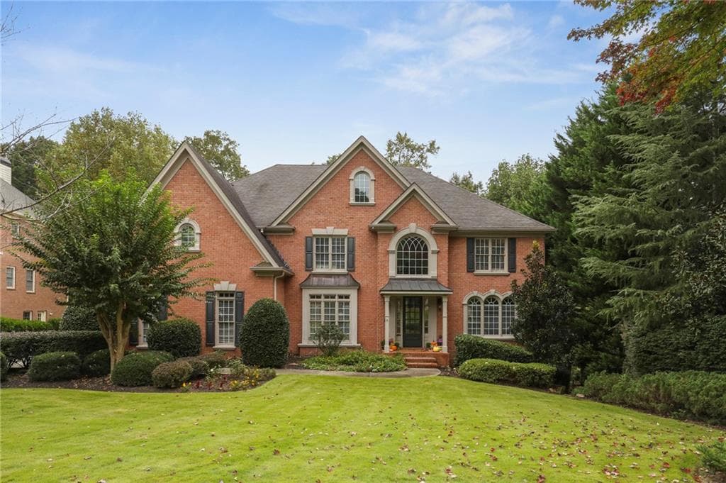 6 bedroom, 6 bathroom, 6,900 sq ft single family residence sold at 1585 Eversedge Drive, Alpharetta, GA 30009