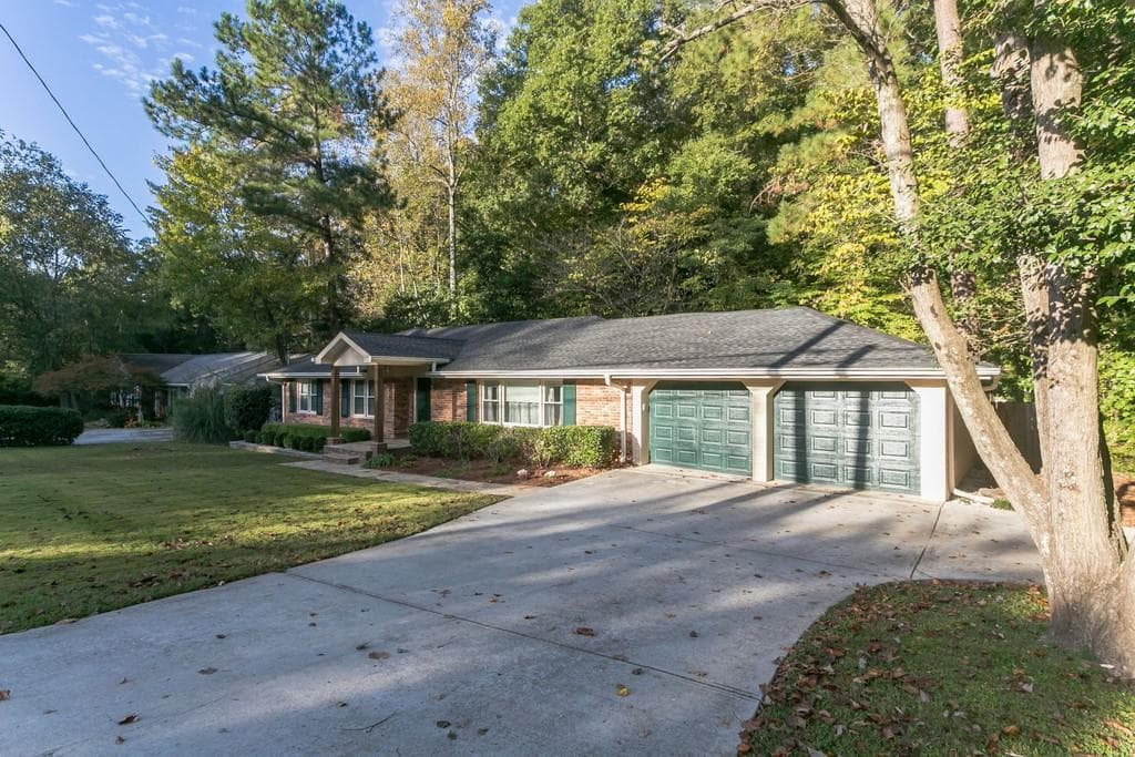 3 bedroom, 2 bathroom, 1,839 sq ft single family residence sold at 1652 Oak Grove Road, Decatur, GA 30033