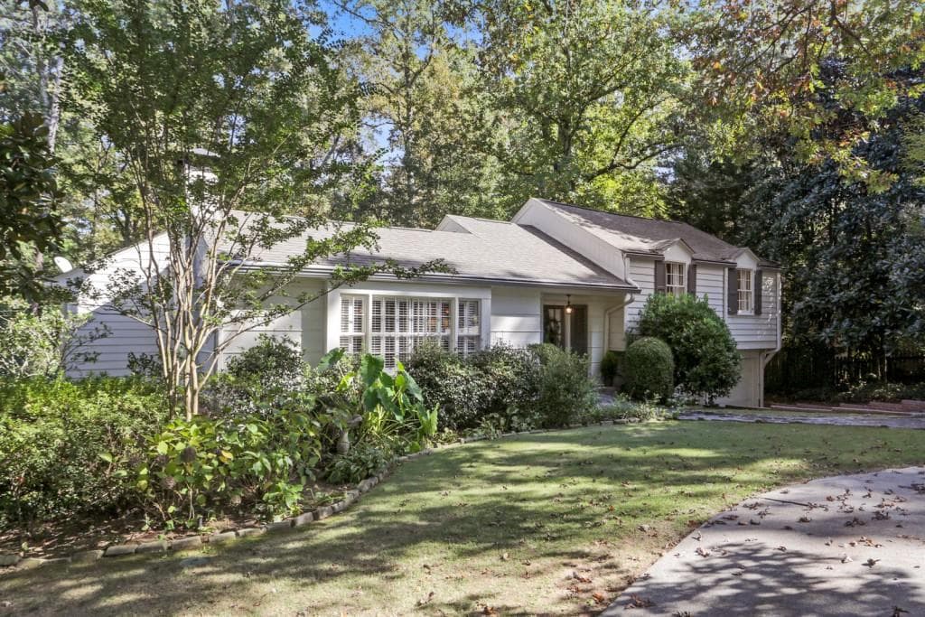 4 bedroom, 5 bathroom single family residence sold at 3833 Lake Forrest Drive, Atlanta, GA 30342