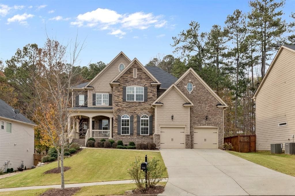 5 bedroom, 4 bathroom, 3,465 sq ft single family residence sold at 702 Sterling Reserve, Canton, GA 30115